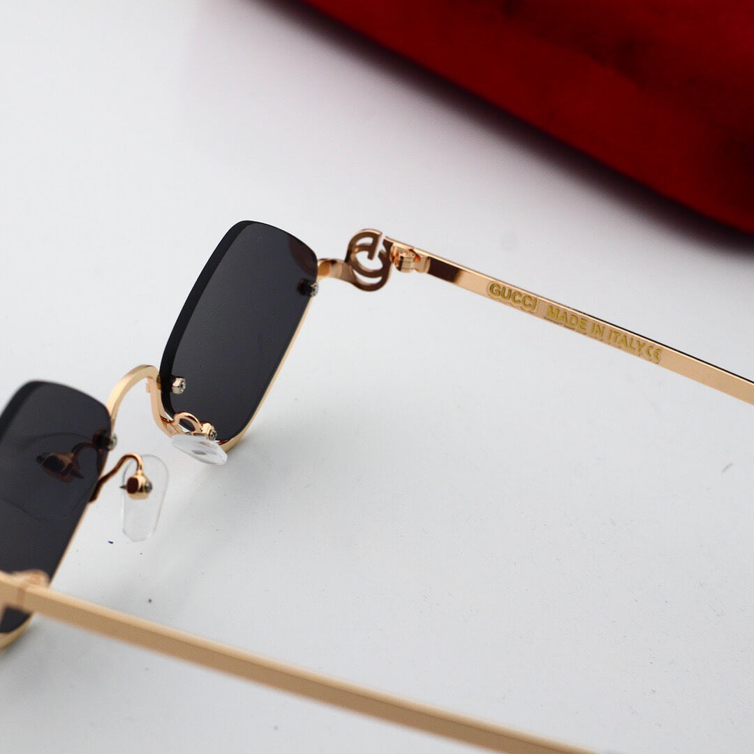 Gafas de sol de moda con media montura y rombos