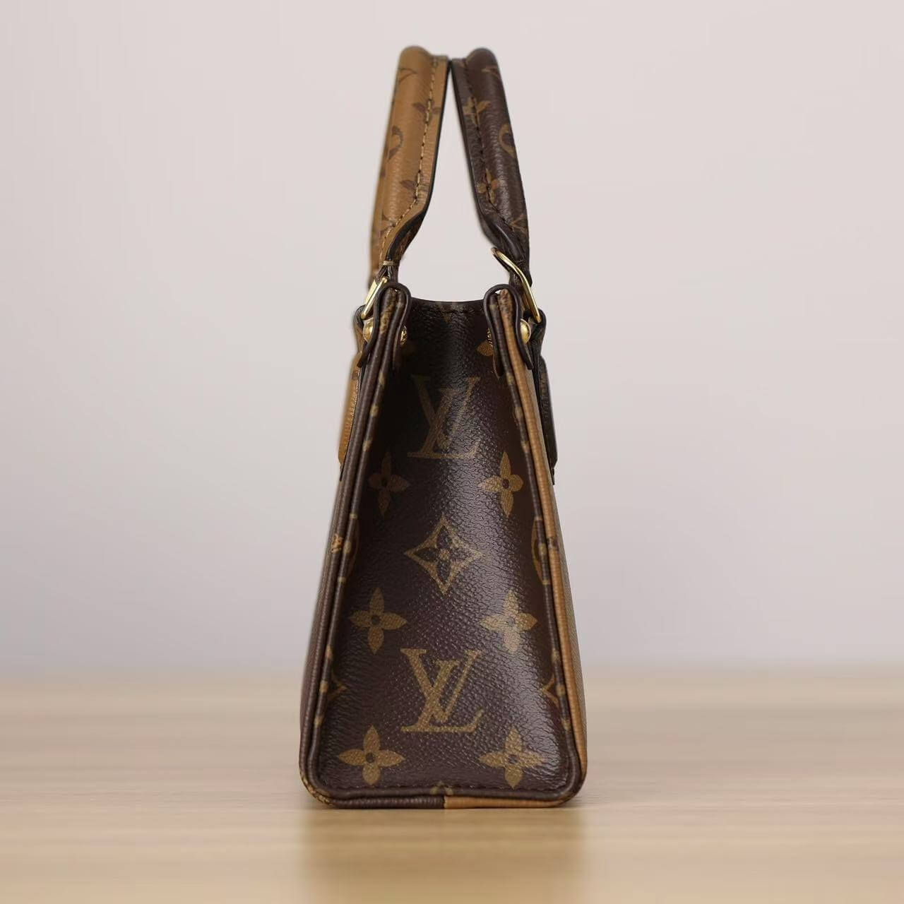 Bolsa de mano con estampado bicolor de doble cara