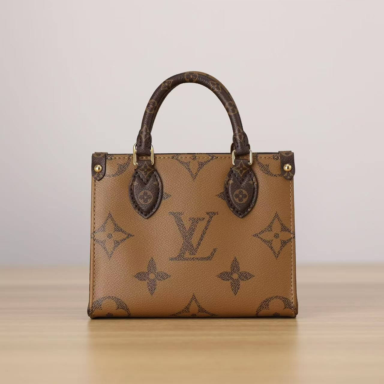 Bolsa de mano con estampado bicolor de doble cara