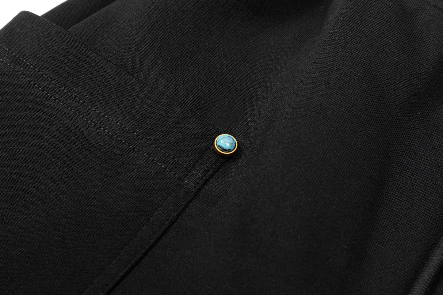 Short à boucle turquoise