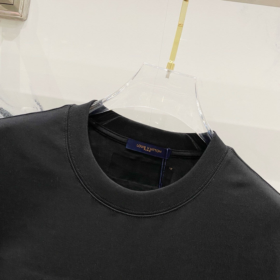 Camiseta bordada con estampado verde