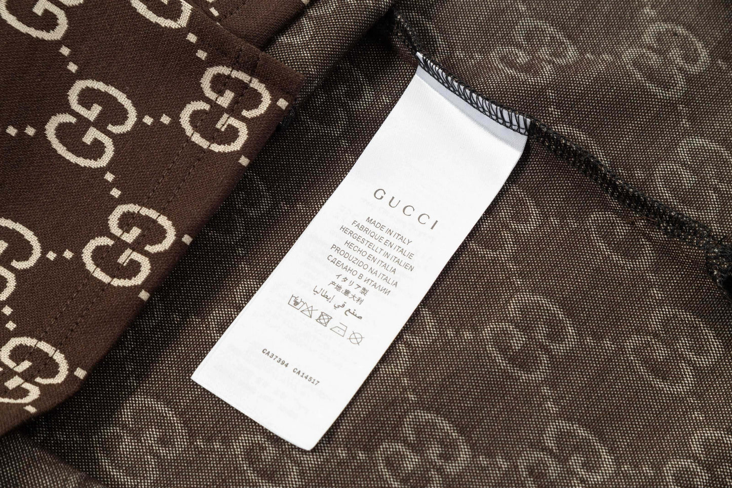 Polo con estampado completo de doble G