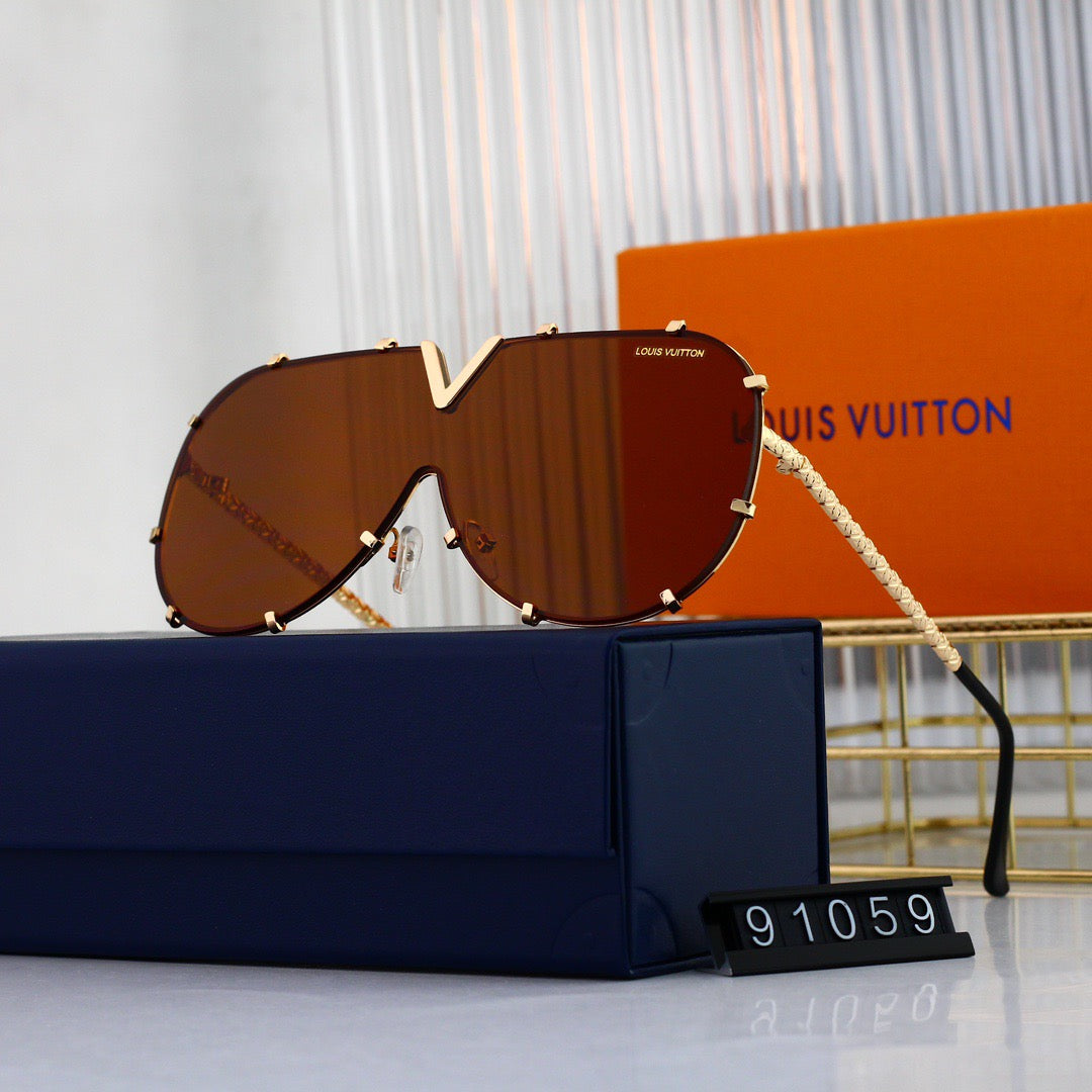 Gafas de sol modernas con montura metálica en forma de V