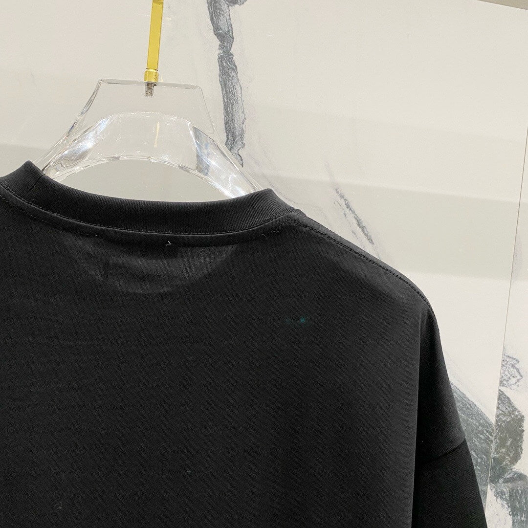 Camiseta bordada con estampado verde