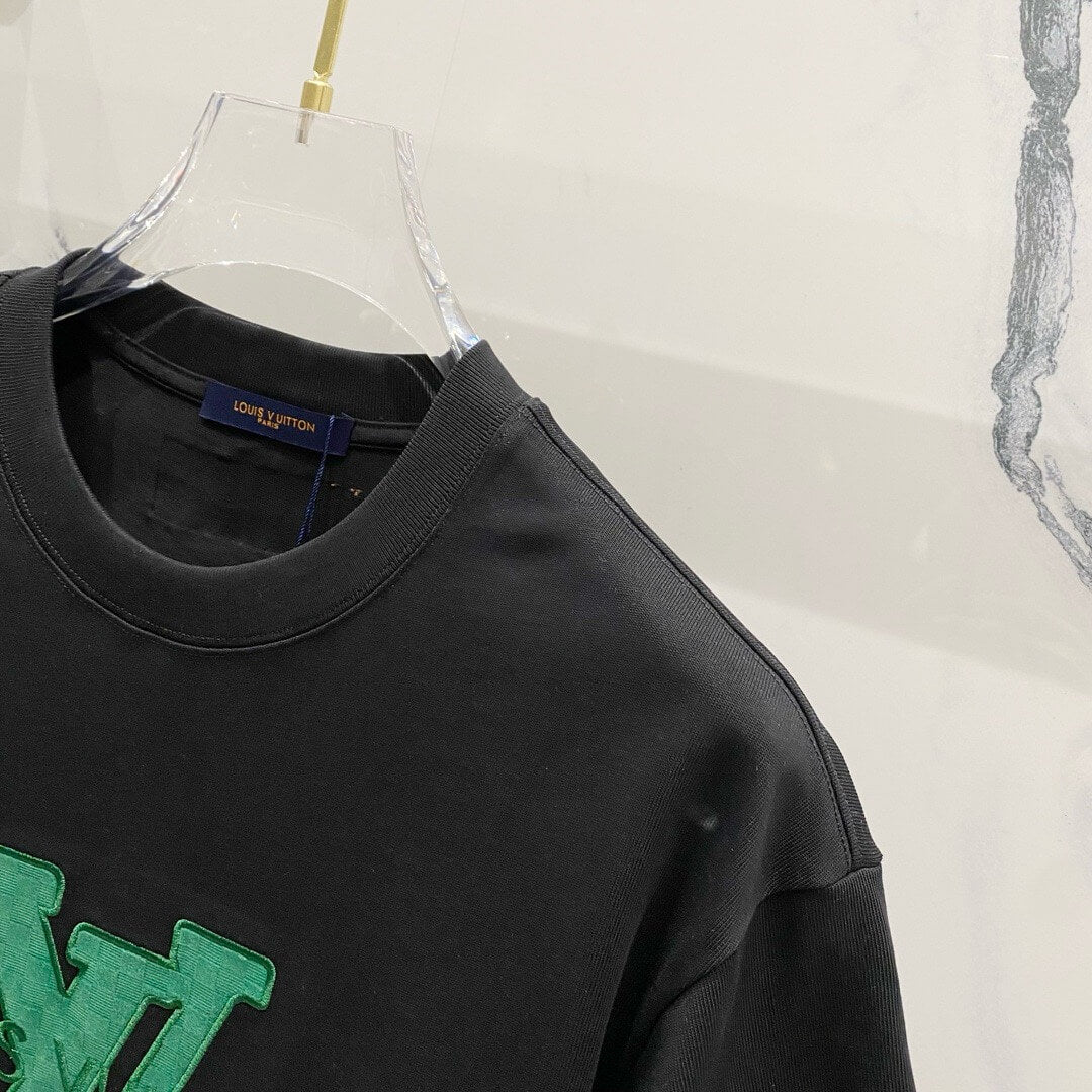 Camiseta bordada con estampado verde