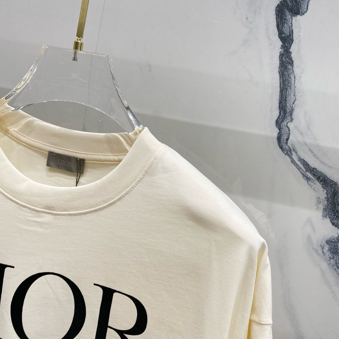 Camiseta con mangas articuladas