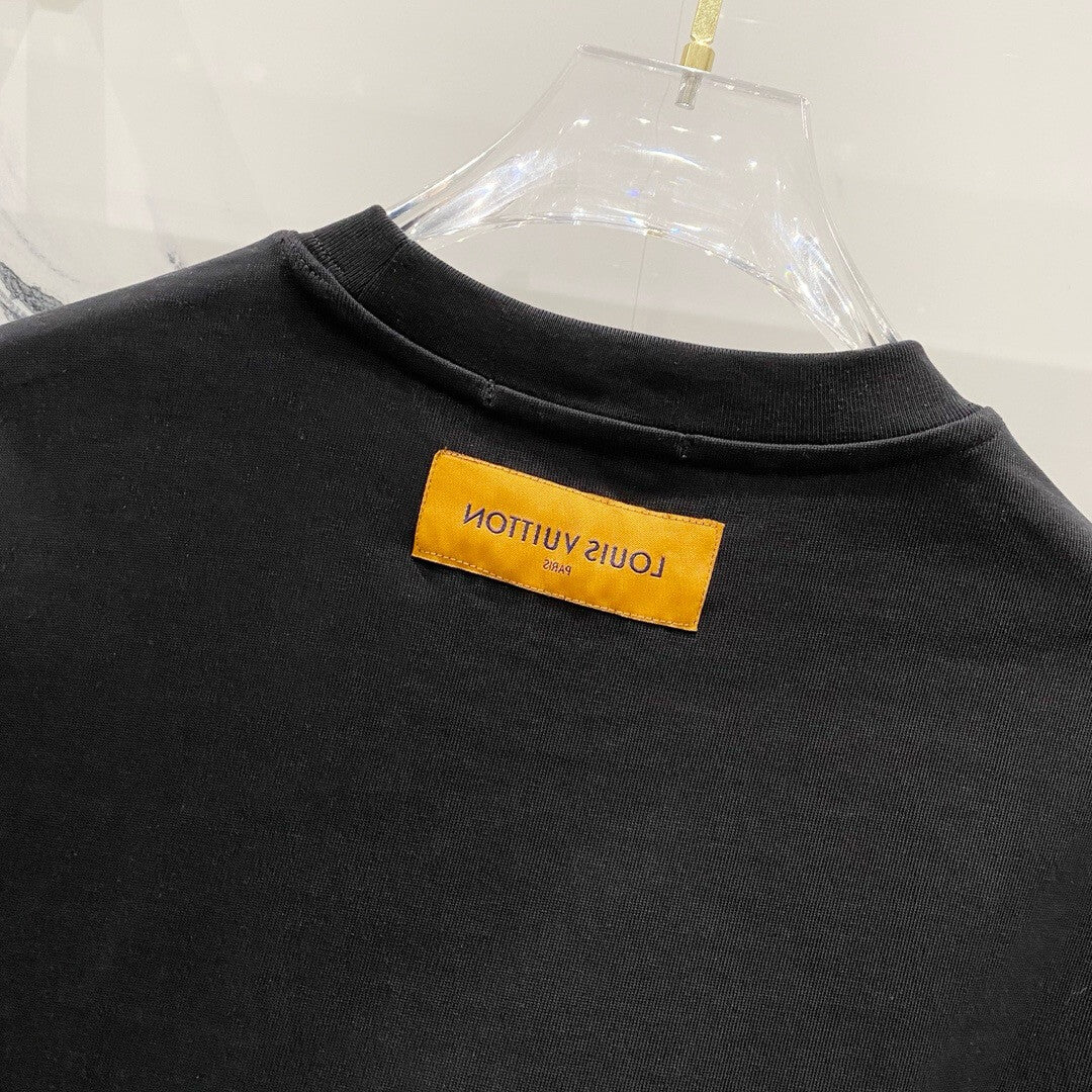 Camiseta bordada con estampado verde