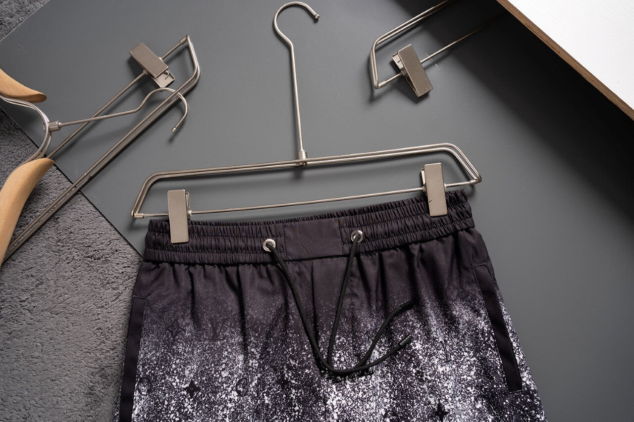 Pantalones cortos de playa con cielo estrellado