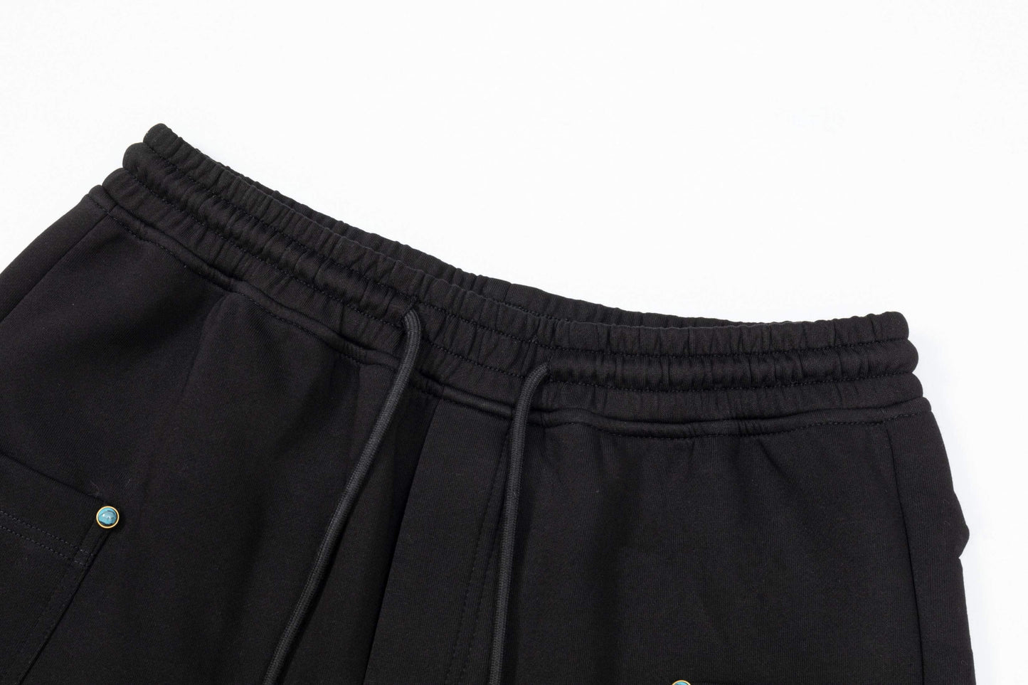 Short à boucle turquoise