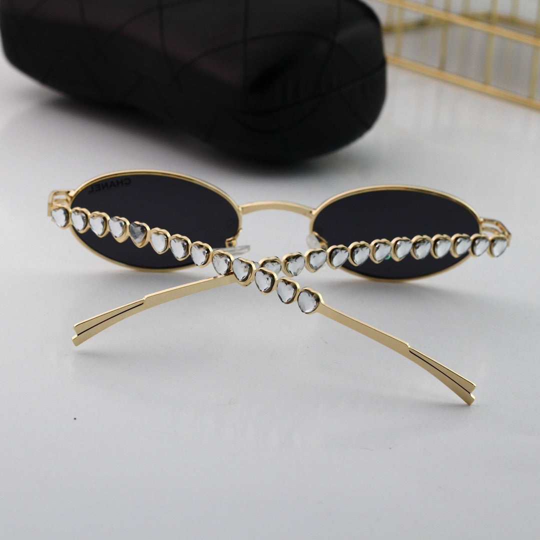 Gafas de sol vintage en forma de huevo con diamantes de imitación en forma de corazón