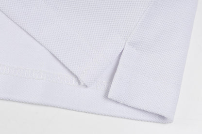 Camiseta polo con costuras de rayas