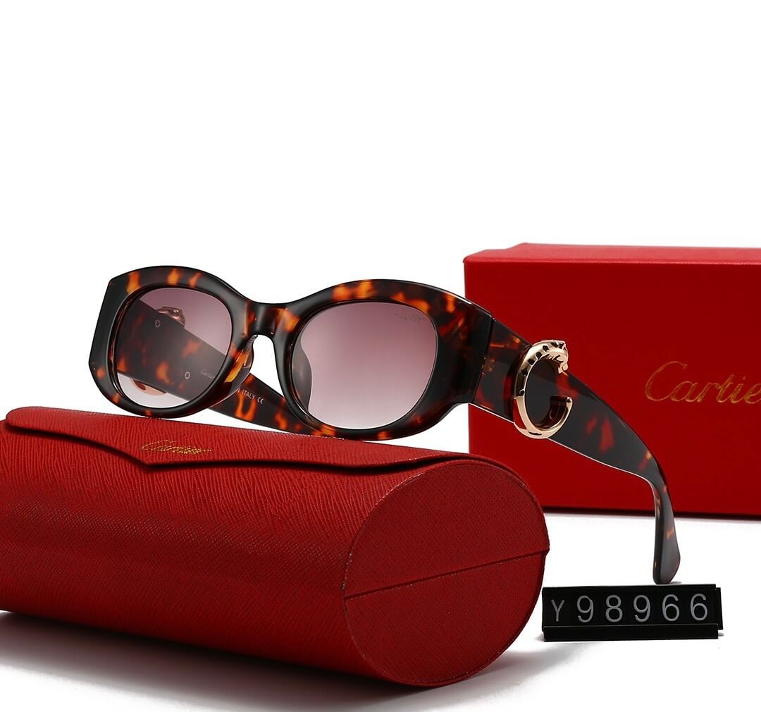 Gafas de sol minimalistas con montura redonda y letra C