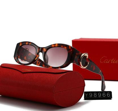 Gafas de sol minimalistas con montura redonda y letra C