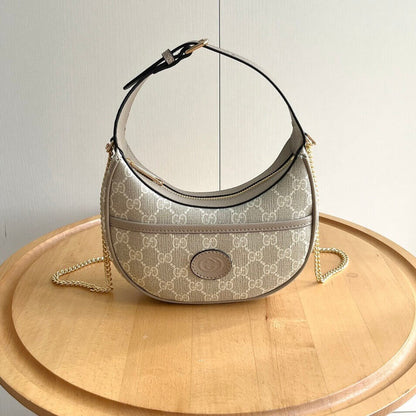 Bolso de hombro vintage de mano en forma de media luna