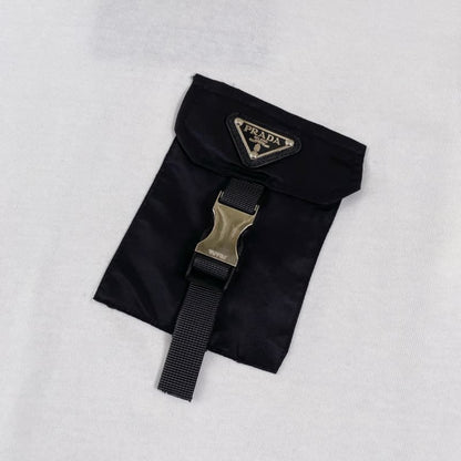 Camiseta con bolsillo utilitario