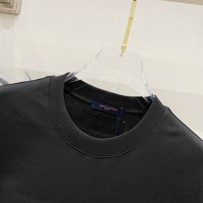 Camiseta bordada con estampado verde