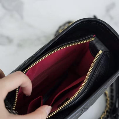 Bolso clásico con estampado acolchado de rombos