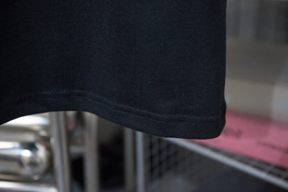 Camiseta vaquera con parches bordados