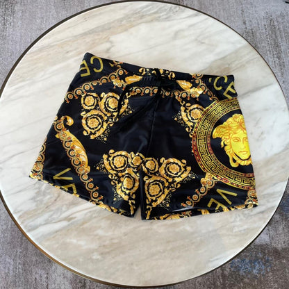 Gold Face Swim Trunks