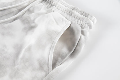 Pantalones cortos con bordado de patrón clásico