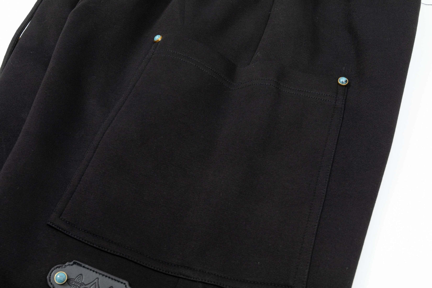 Short à boucle turquoise