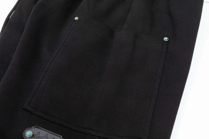 Short à boucle turquoise