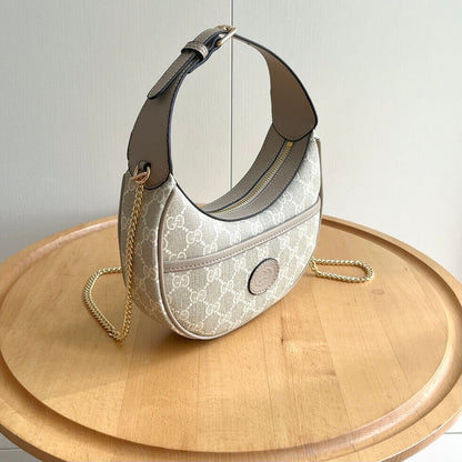 Bolso de hombro vintage de mano en forma de media luna