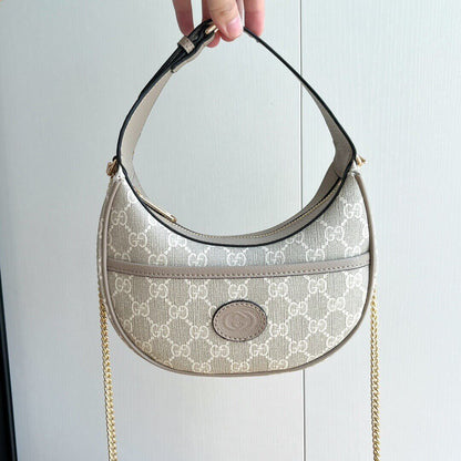 Bolso de hombro vintage de mano en forma de media luna