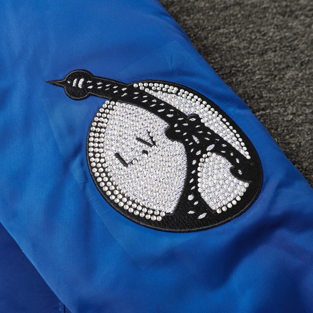 Veste de baseball bleue à strass