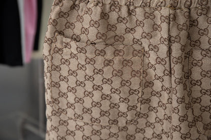 Pantalones cortos marrones con estampado integral