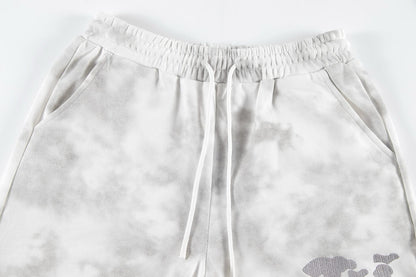 Pantalones cortos con bordado de patrón clásico