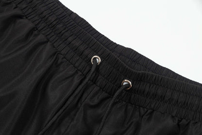Pantalones cortos de playa de moda con forro de malla