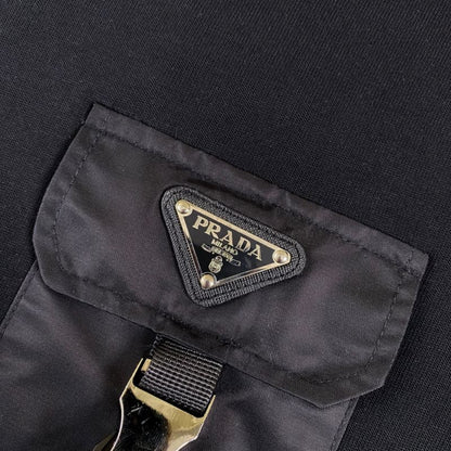 Camiseta con bolsillo utilitario