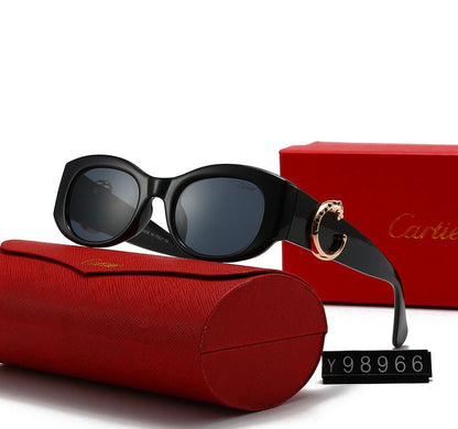 Gafas de sol minimalistas con montura redonda y letra C