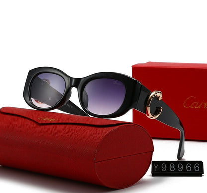 Gafas de sol minimalistas con montura redonda y letra C